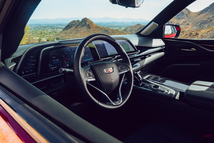 Shot from the drivers side window of the steering wheel and dash in the 2023 Escalade-V.
